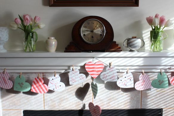 Even though it is March, I kept the Valentine hearts up because I thought they looked pretty with the flowers.